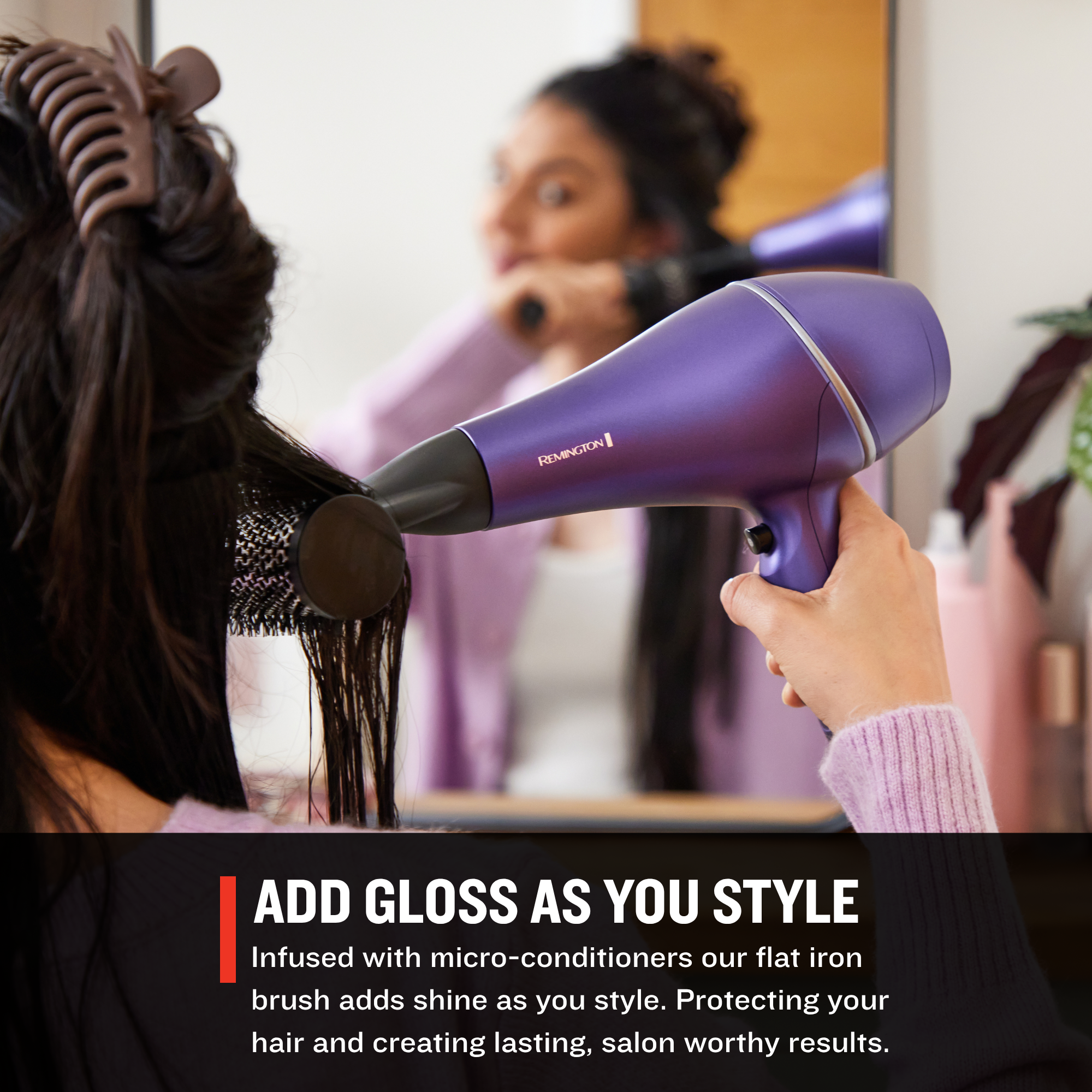 Person using a AC9350US Gloss™ Hair Dryer with a concentrator attachment to style hair, with text about micro-conditioners and gloss.