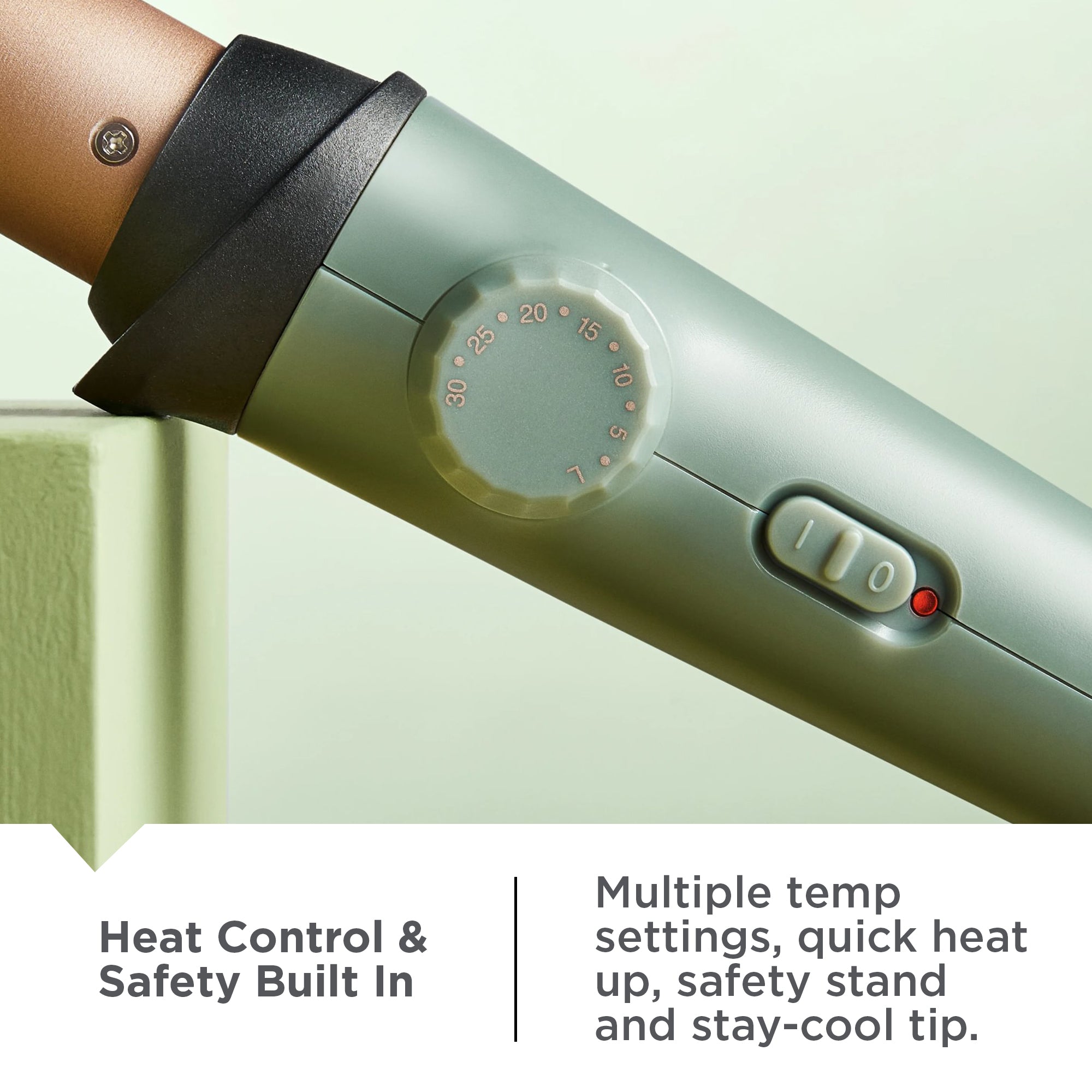 Botanicals™ Tapered Curling Wand with temperature control dial on a light green background