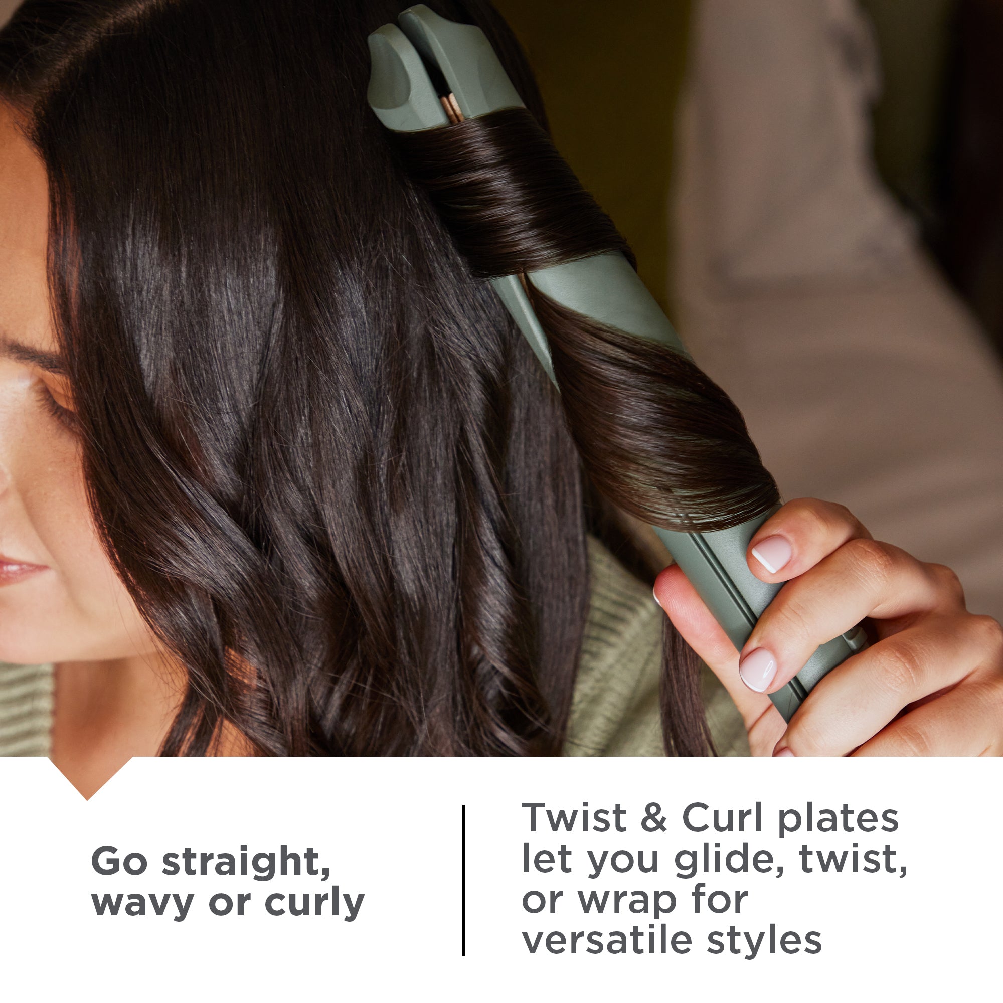 Woman using a S5777NA Botanicals™ 1 Twist & Curl Multi-Styler to curl her hair