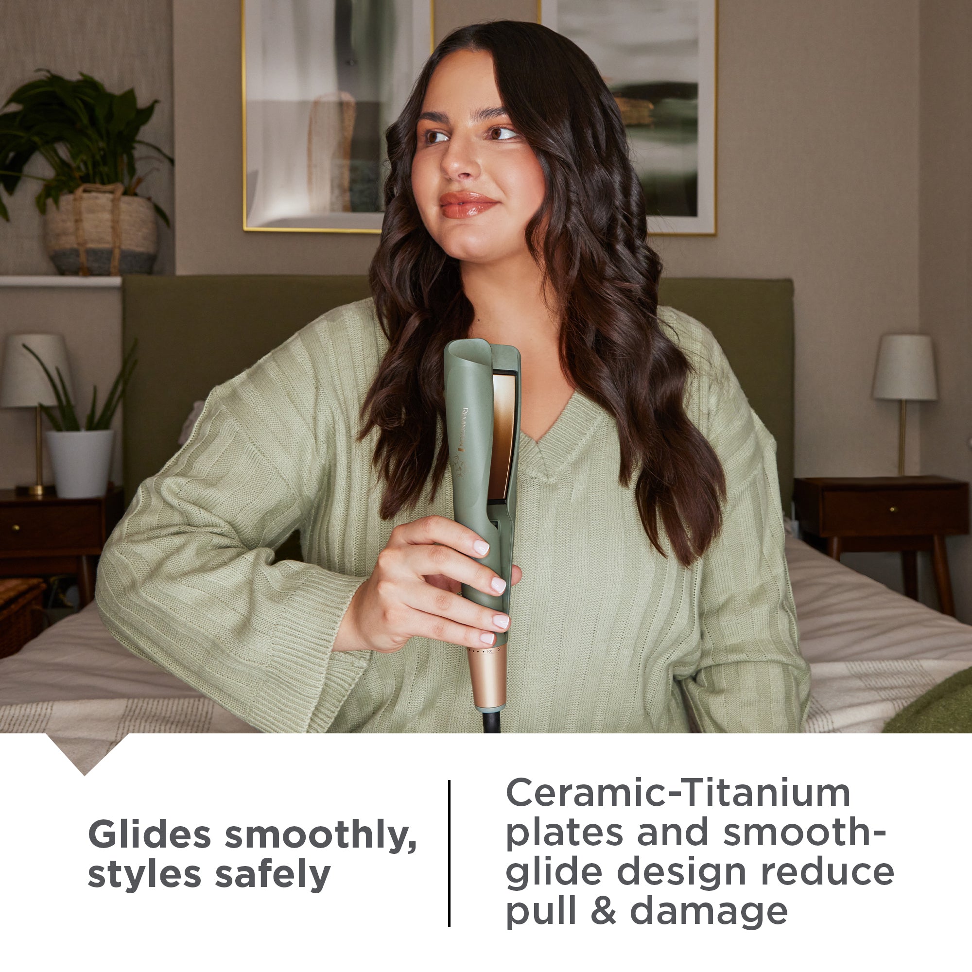Woman holding a S5777NA Botanicals™ 1 Twist & Curl Multi-Styler in a bedroom setting