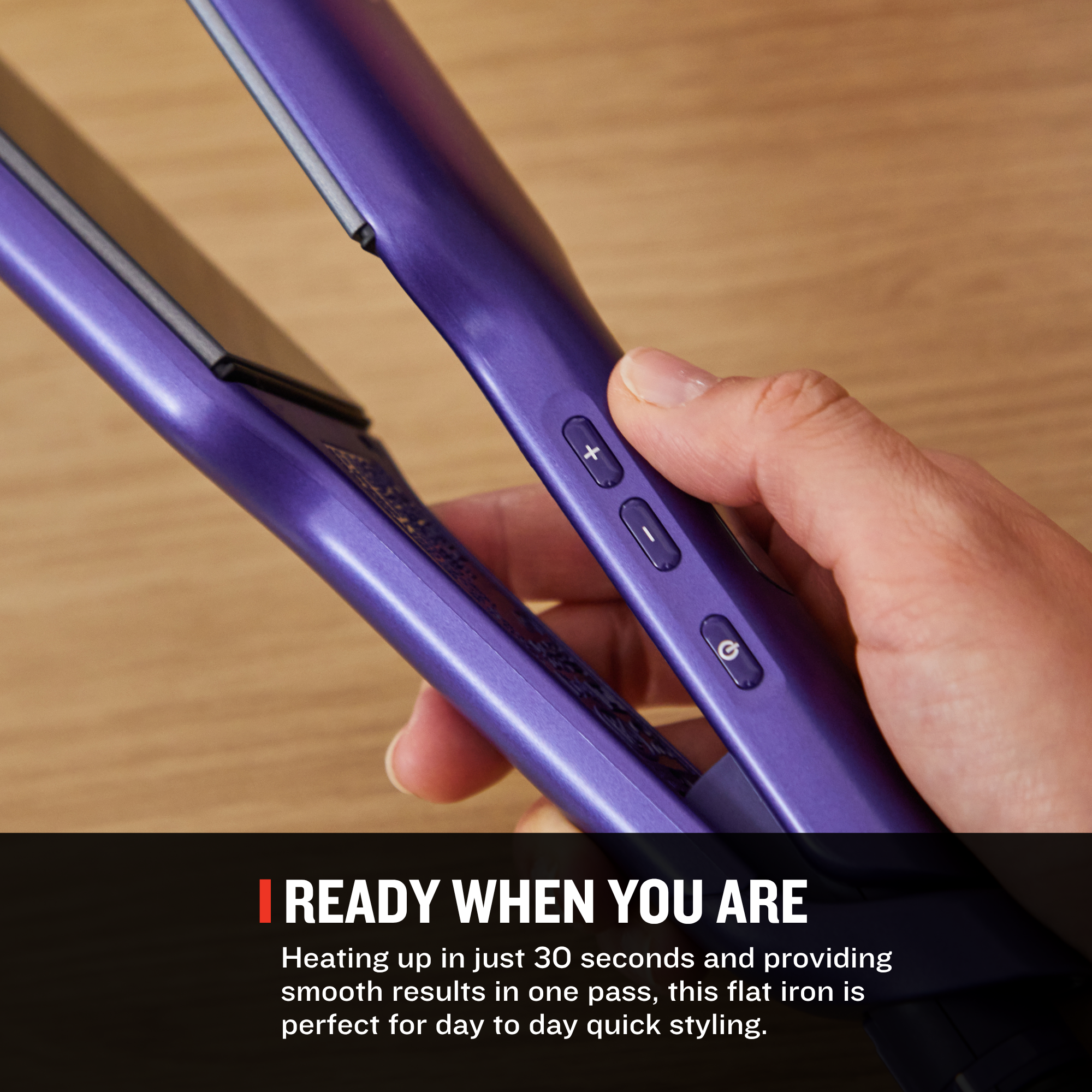 Purple hair straightener held by a hand on a wooden surface with text about its quick heating time and ease of use.