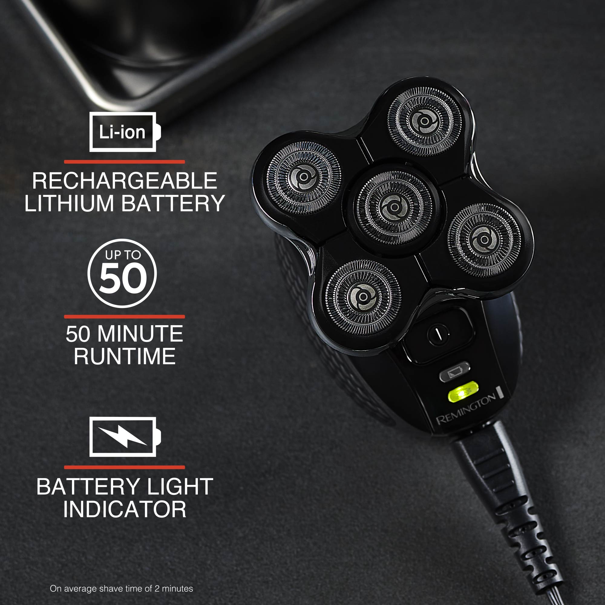 Electric shaver with charging cable on a dark background, featuring battery information text.