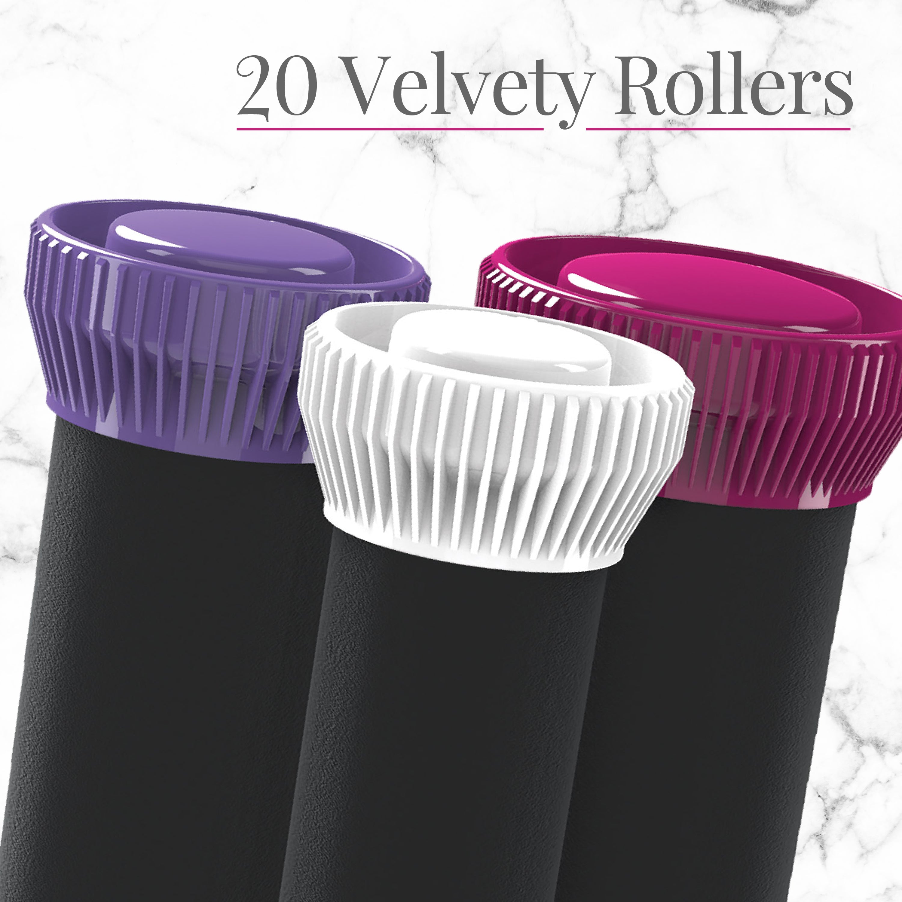Three velvety rollers with purple, white, and pink tops on a marble background.