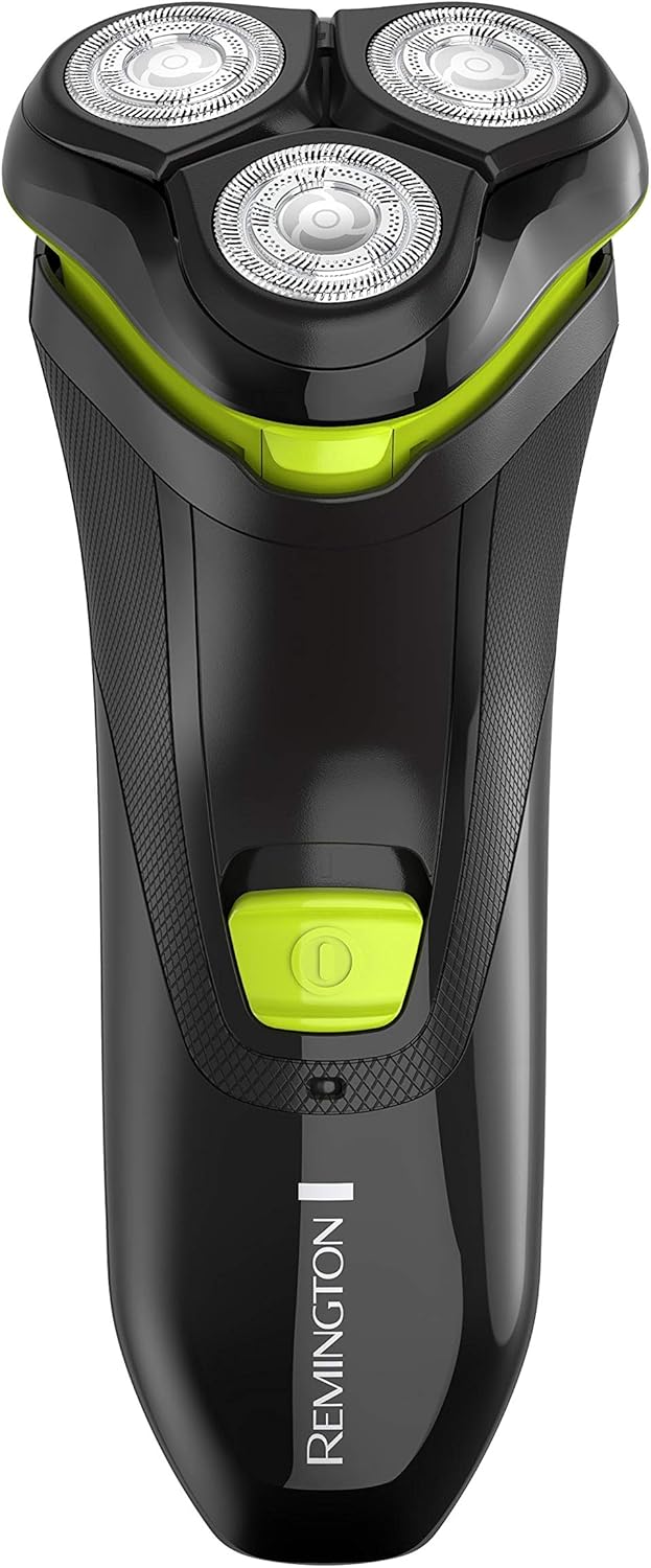 Black and green electric shaver with 'Remington' branding on a white background