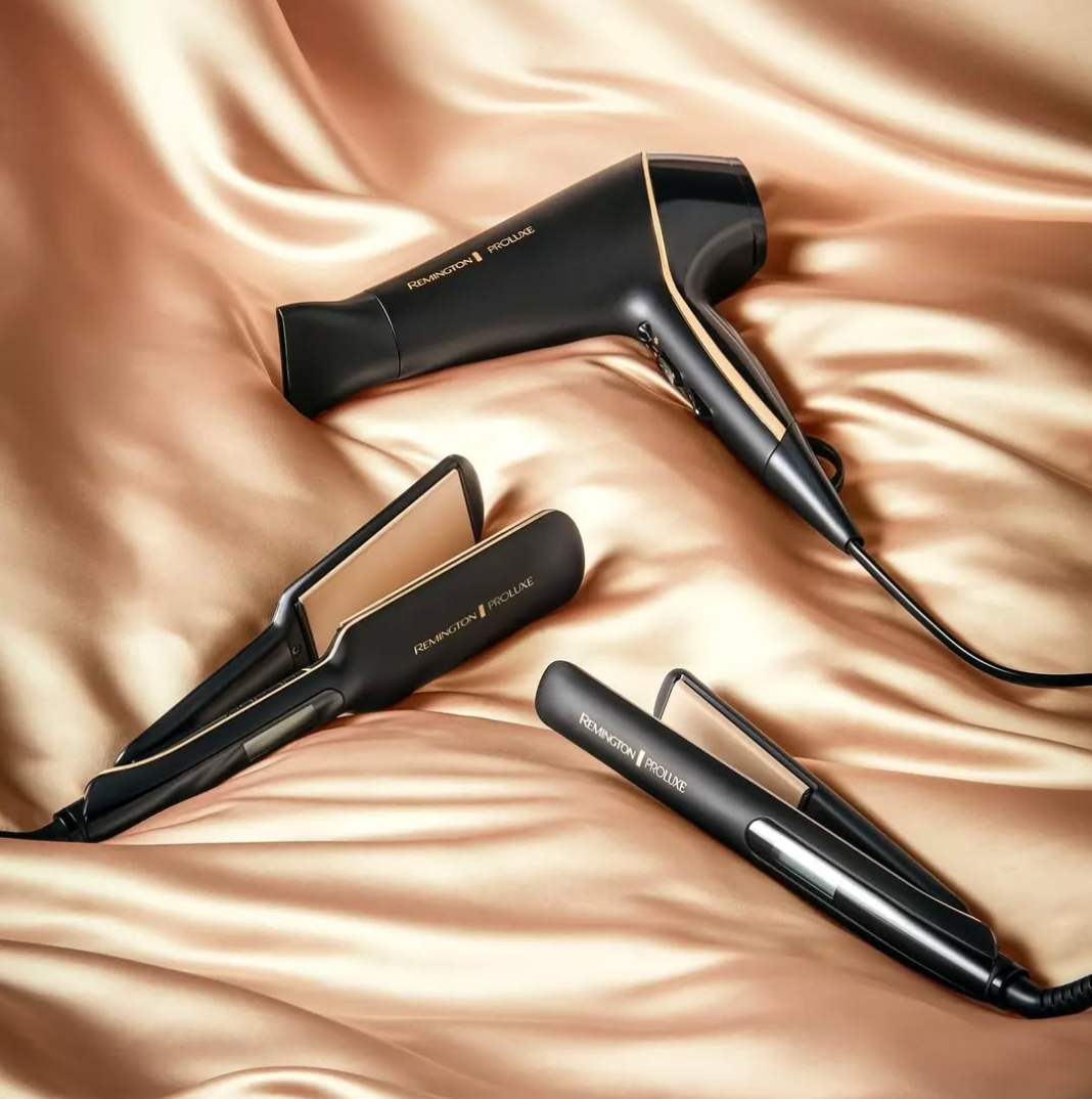 Hair care collection products on golden silk fabric