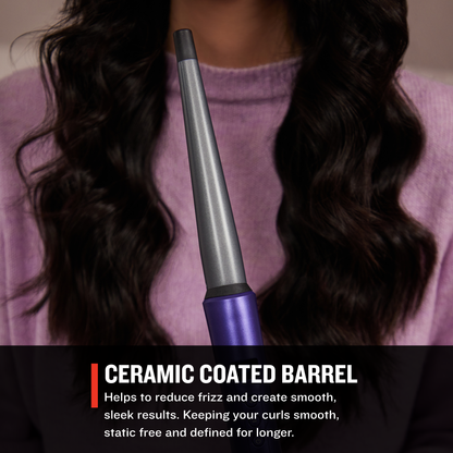 CI93X0US Gloss™ Tapered Curling Wandwith ceramic coated barrel held by a person with long, wavy hair.