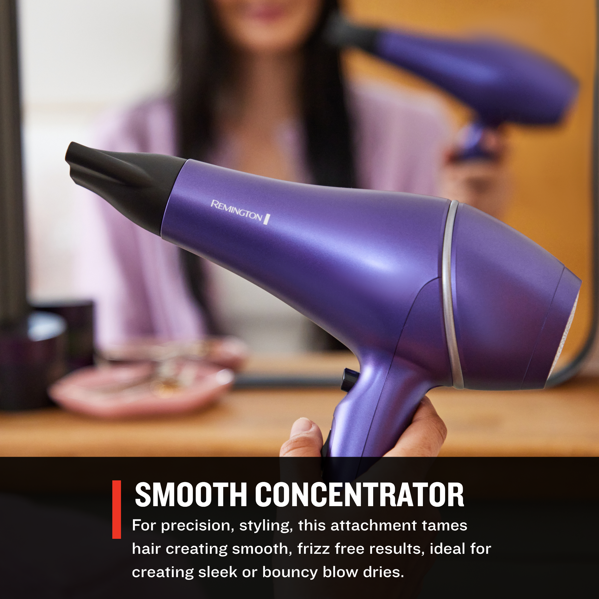 AC9350US Gloss™ Hair Dryer with Remington branding held by a person, with text about the 'Smooth Concentrator' attachment.