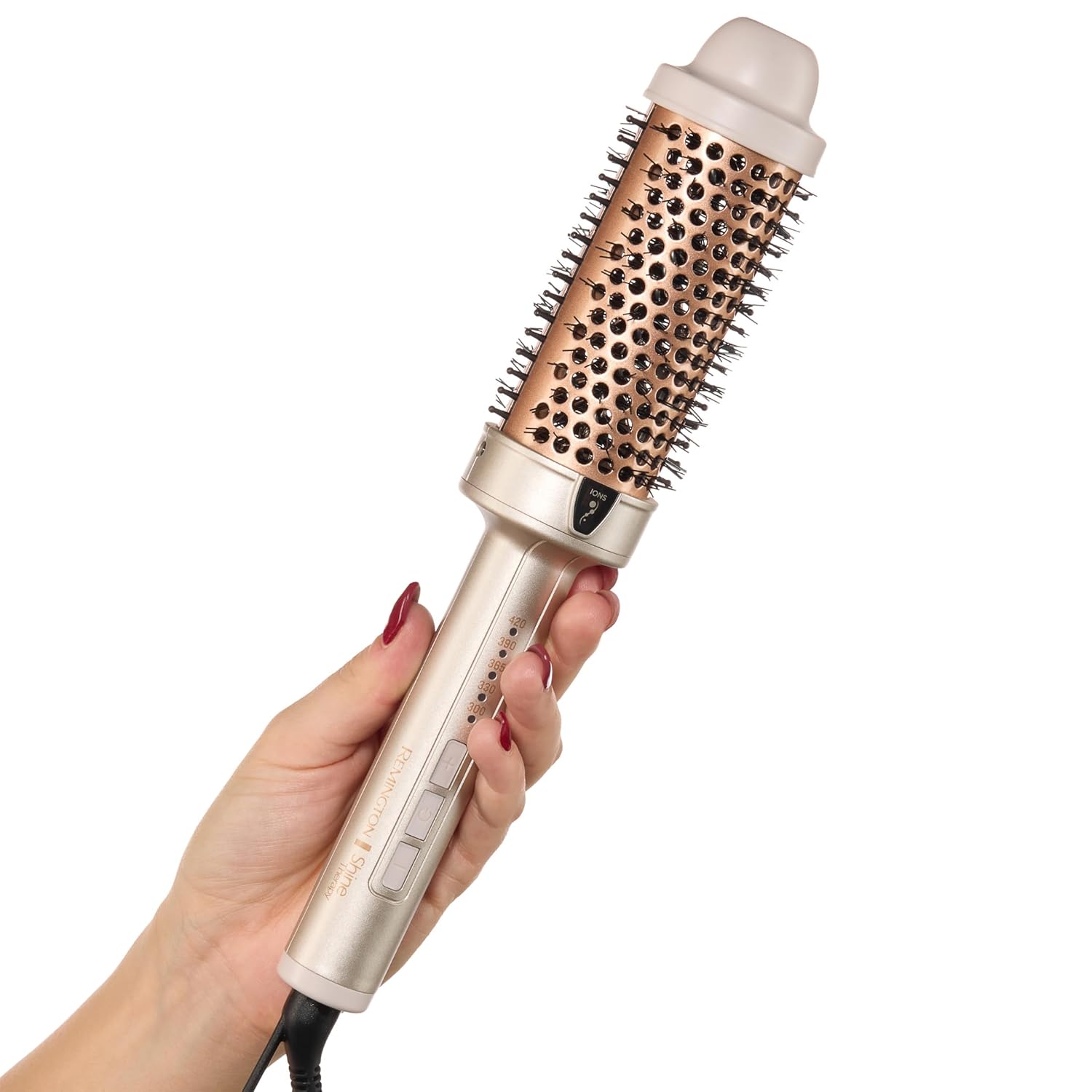 Hair styling tool held by a hand on a white background