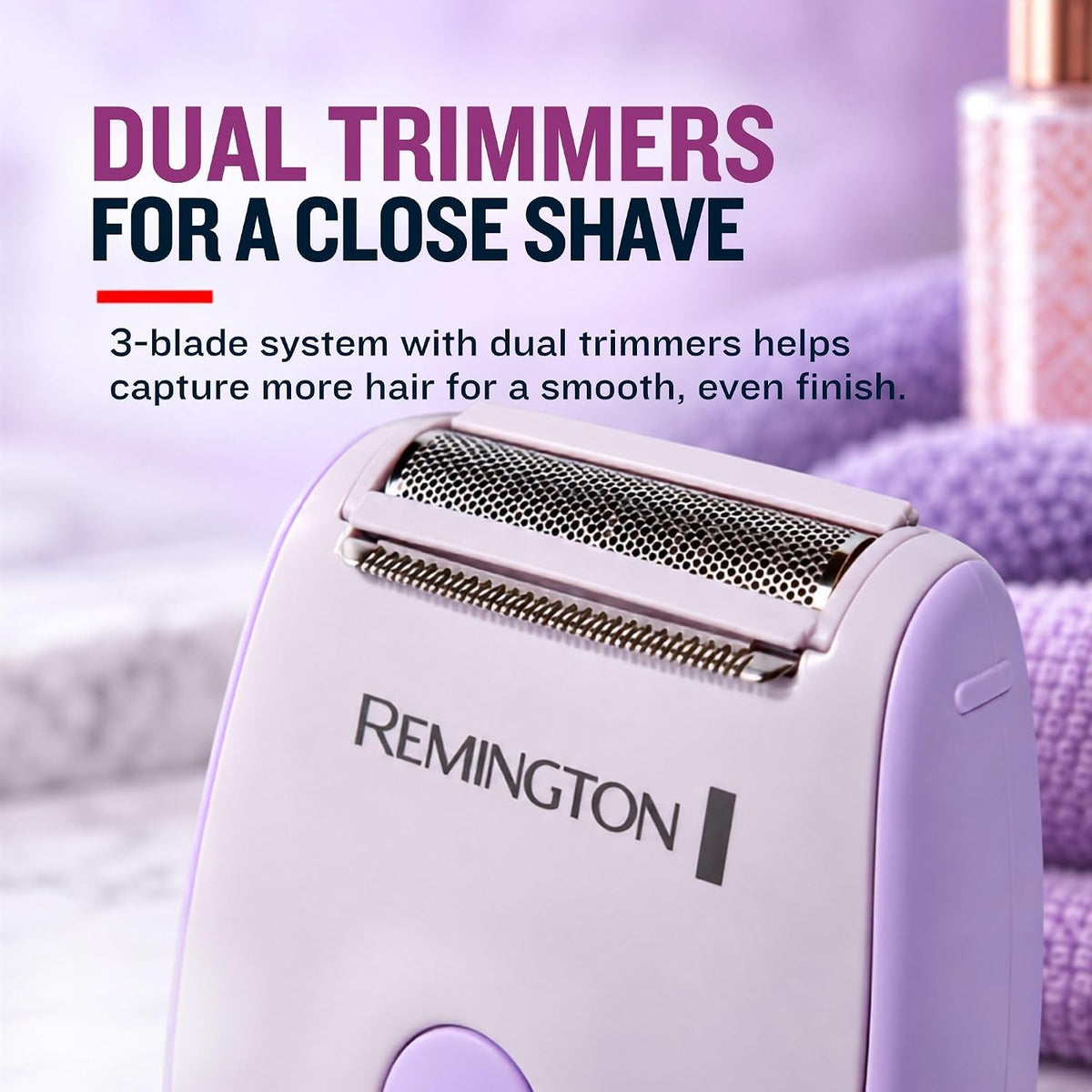 A close-up of a Remington dual trimmer electric shaver on softly blurred background.