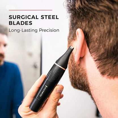 Person using a black electric razor to trim ear hair with text 'Surgical Steel Blades' and 'Long-Lasting Precision'.