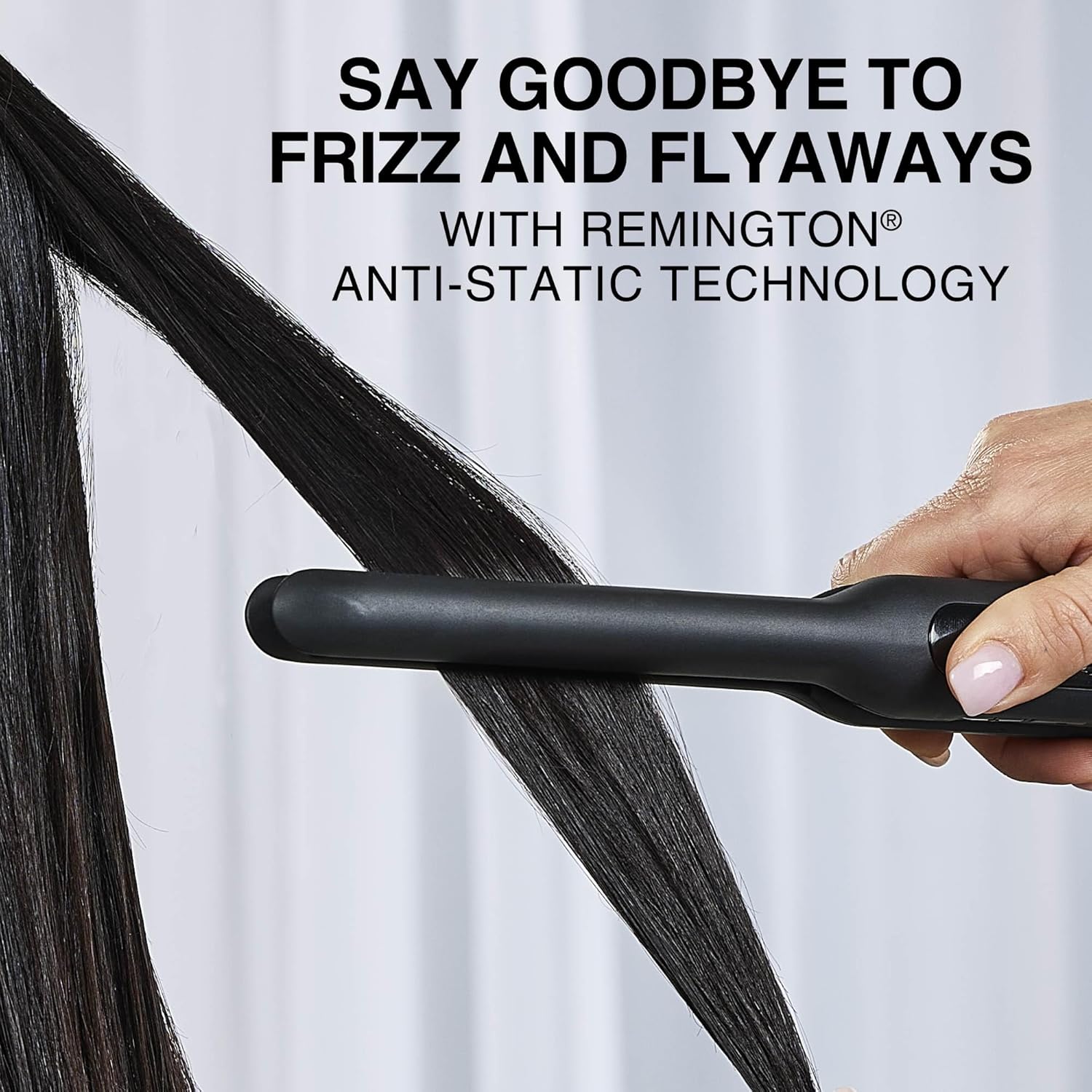 Person using a Remington hair straightener on straight hair with text about anti-static technology.