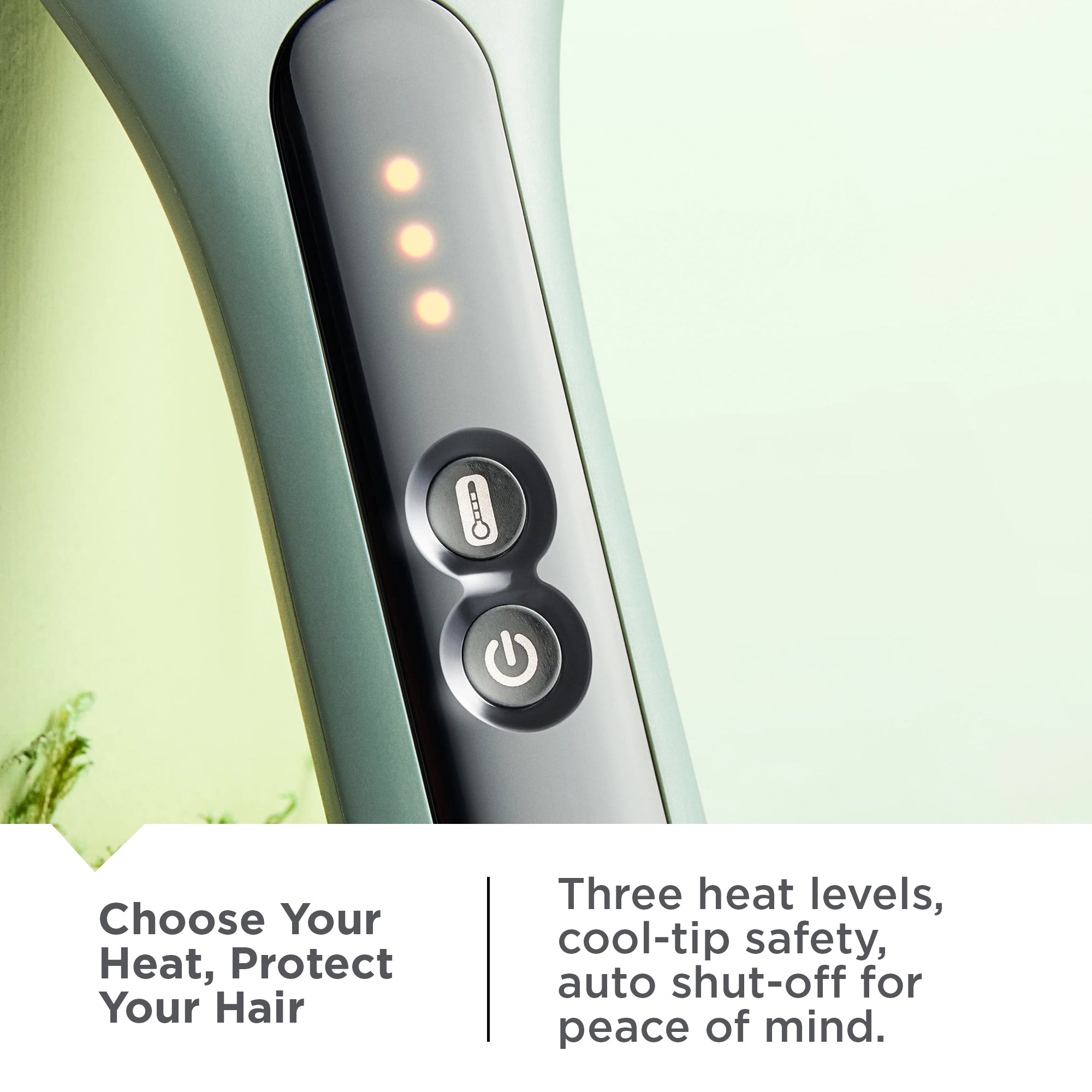 CB5750NA Botanicals™ Straightening Brush  with control buttons and text about heat levels and safety features on a light green background.