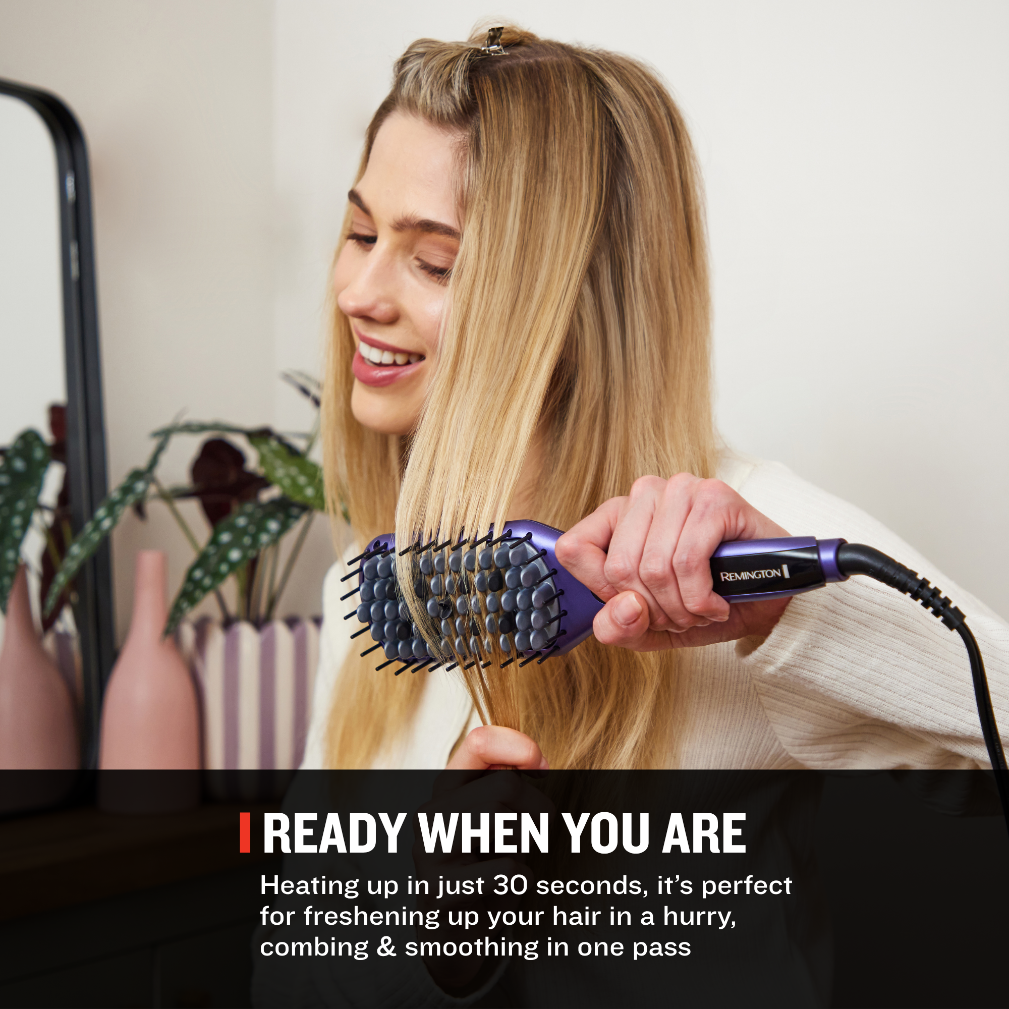 Girl straightening hair with Remington straightening brush with copy saying Ready When You Are