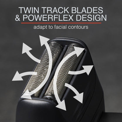 Close-up of a grooming tool with 'Twin Track Blades & Powerflex Design' text on a dark background.