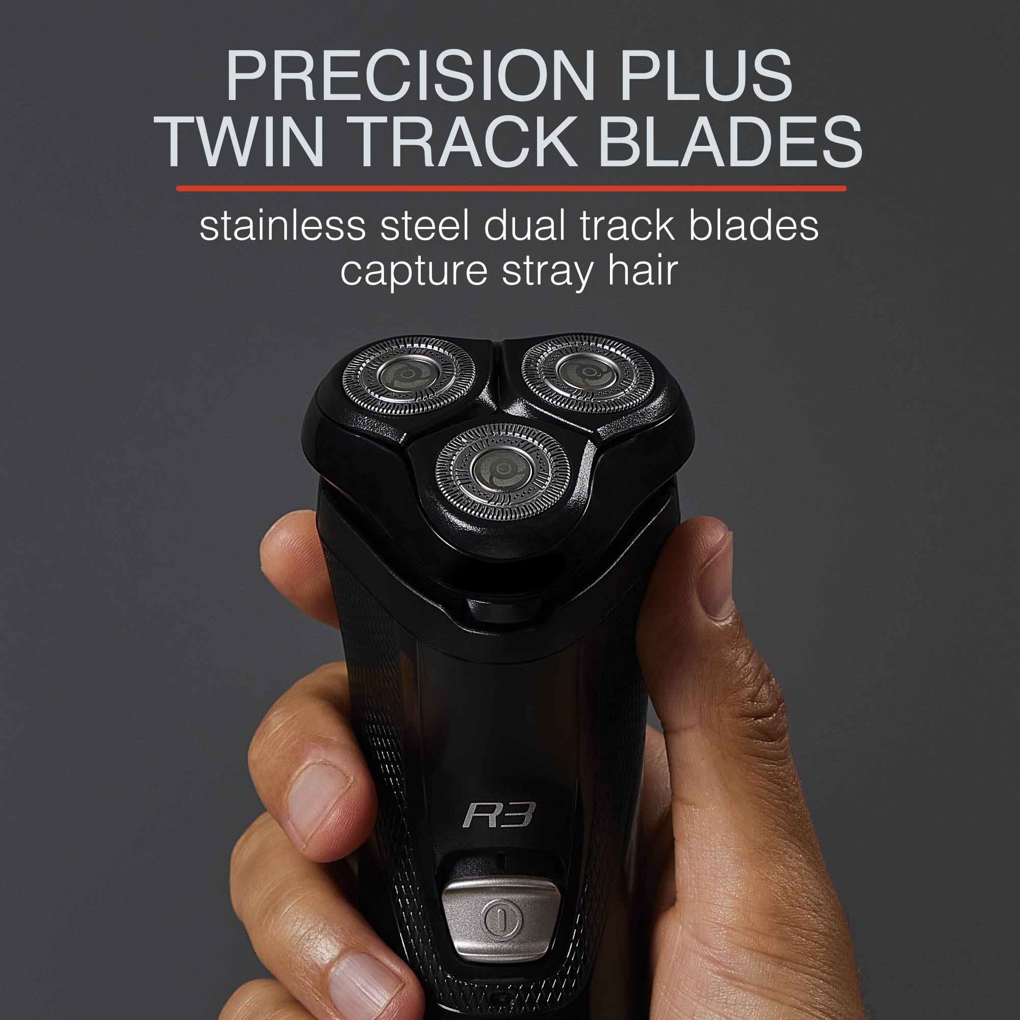 Closeup of hand holding R3 Style Series Rotary Shaver showing stainless track blades
