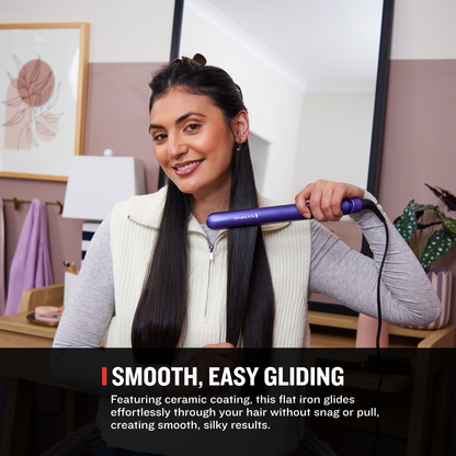 A woman with long, straight dark hair uses a purple flat iron on her hair in a styled indoor setting. A text banner at the bottom reads 'SMOOTH, EASY GLIDING' with descriptive copy about the flat iron's ceramic coating.