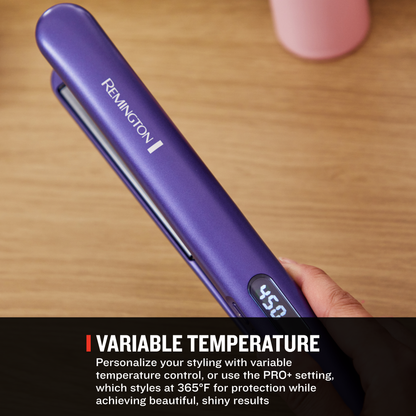 A purple Remington hair straightener is held in a hand over a wooden surface, with a text banner at the bottom highlighting variable temperature styling.
