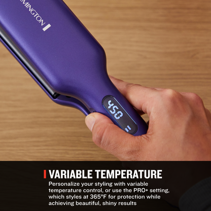 A close-up of a hand holding a purple Remington hair straightener over a wooden surface, with a digital display showing 450. Text at the bottom reads 'VARIABLE TEMPERATURE' with descriptive copy.