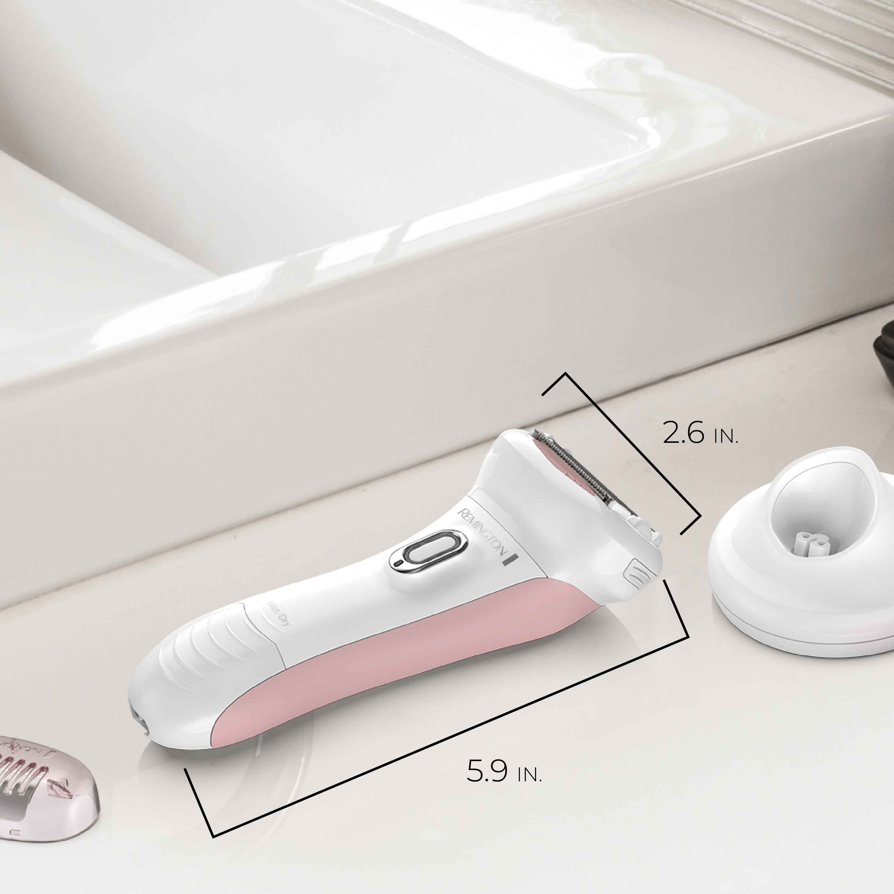 WDF5035 White and pink electric shaver on a bathroom counter with measurements shown.