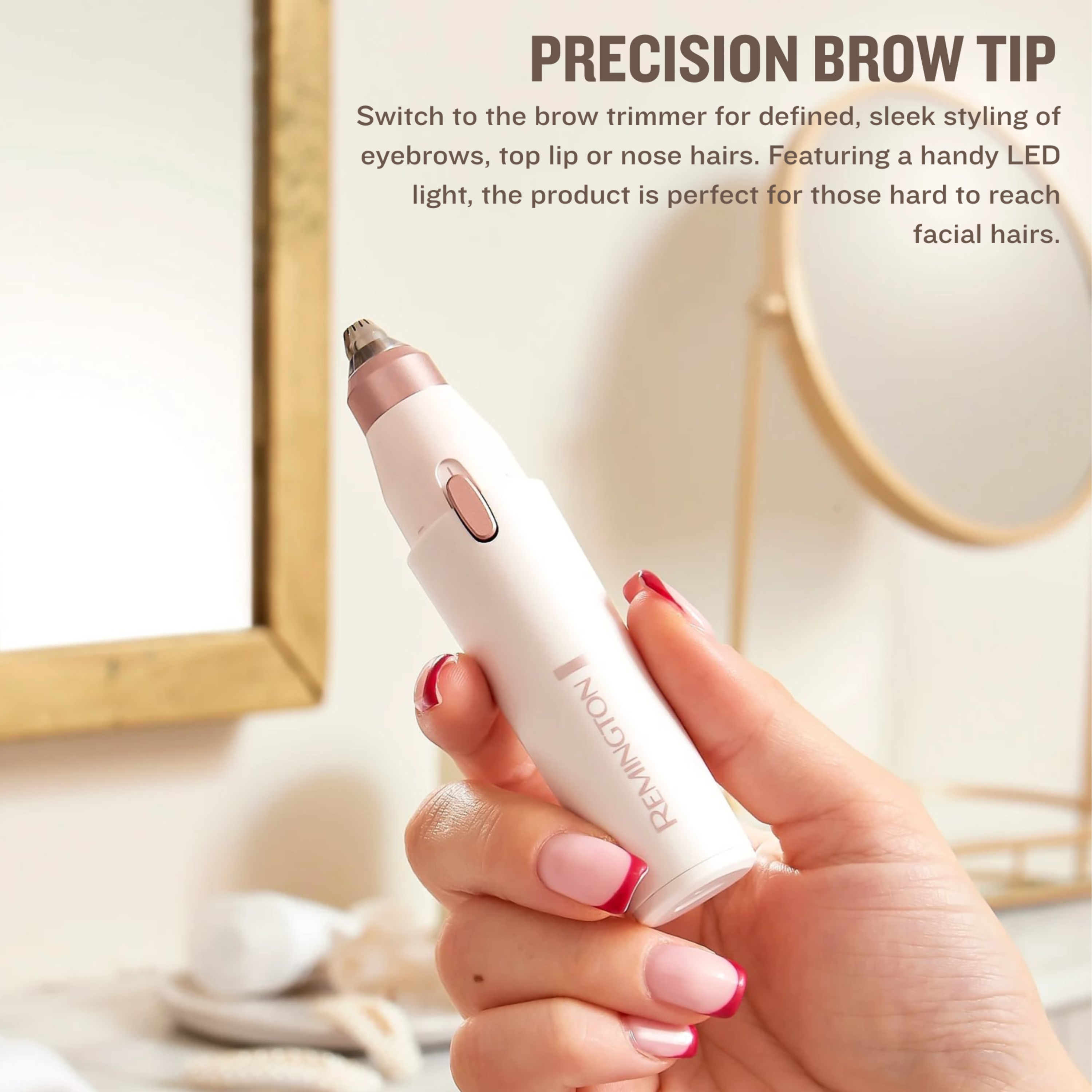 Remington facial shaver in a models hand, with the precision attachment