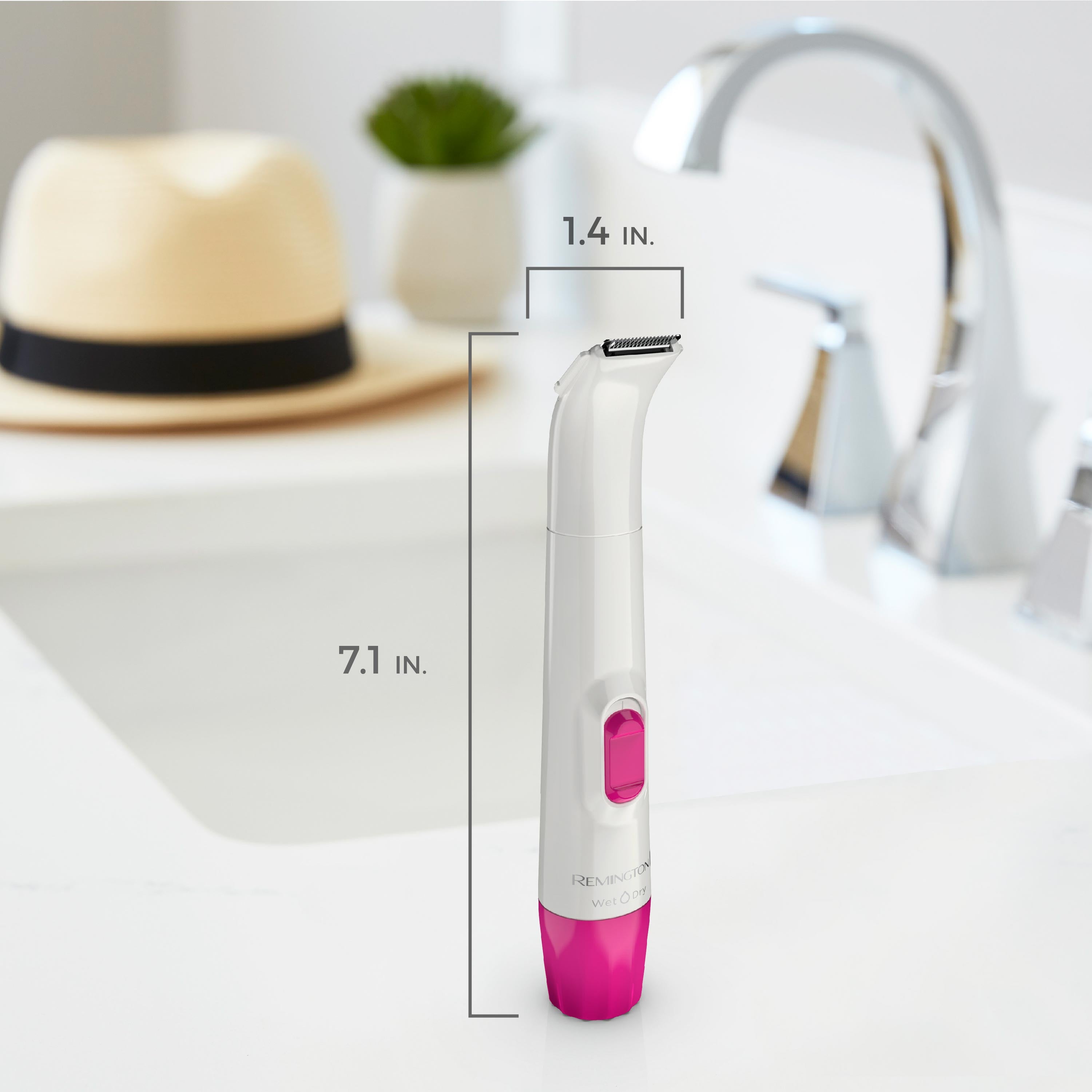 WPG4020FCDN White and pink hair removal device with measurements on a bathroom counter.
