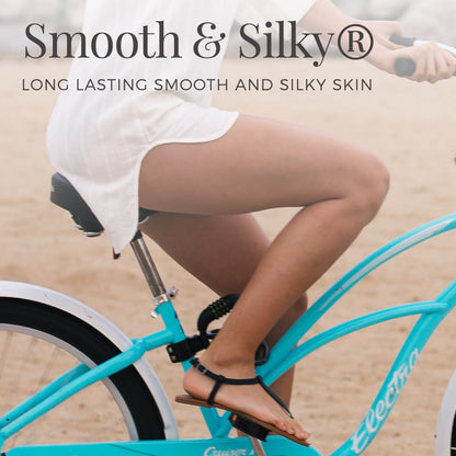 Person riding a bike with 'Smooth & Silky' branding on a blurred background