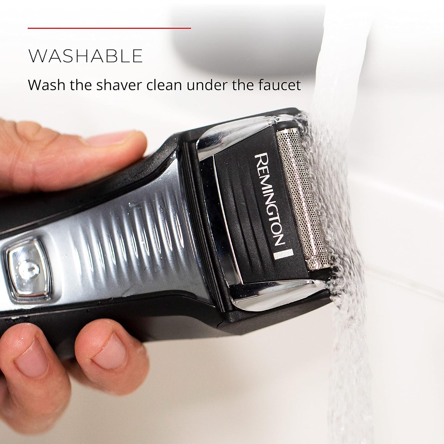 Remington shaver being washed under running water with text indicating it is washable.