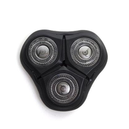 Three-blade electric shaver head on a white background