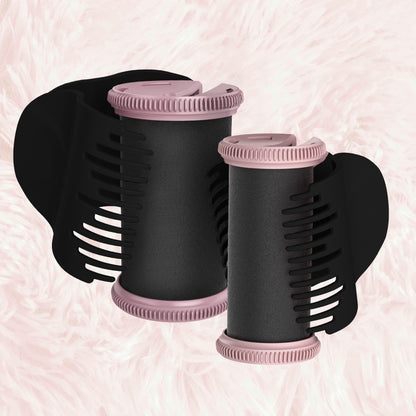 Two black hair roller sets with pink caps on a pink textured background