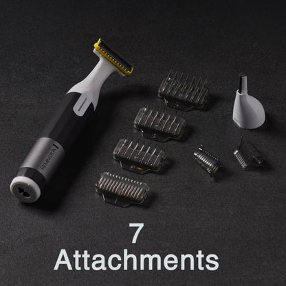 Hair removal tool with multiple attachments on a dark background