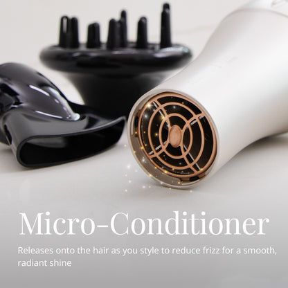 Hair dryer with black diffuser on a light gray background, featuring text about micro-conditioner.