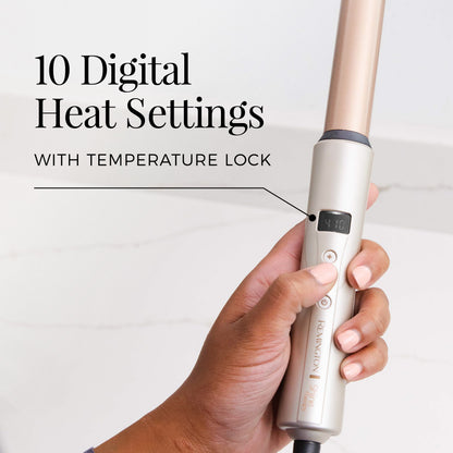 Hand holding a hair styling tool with digital heat settings on a white background