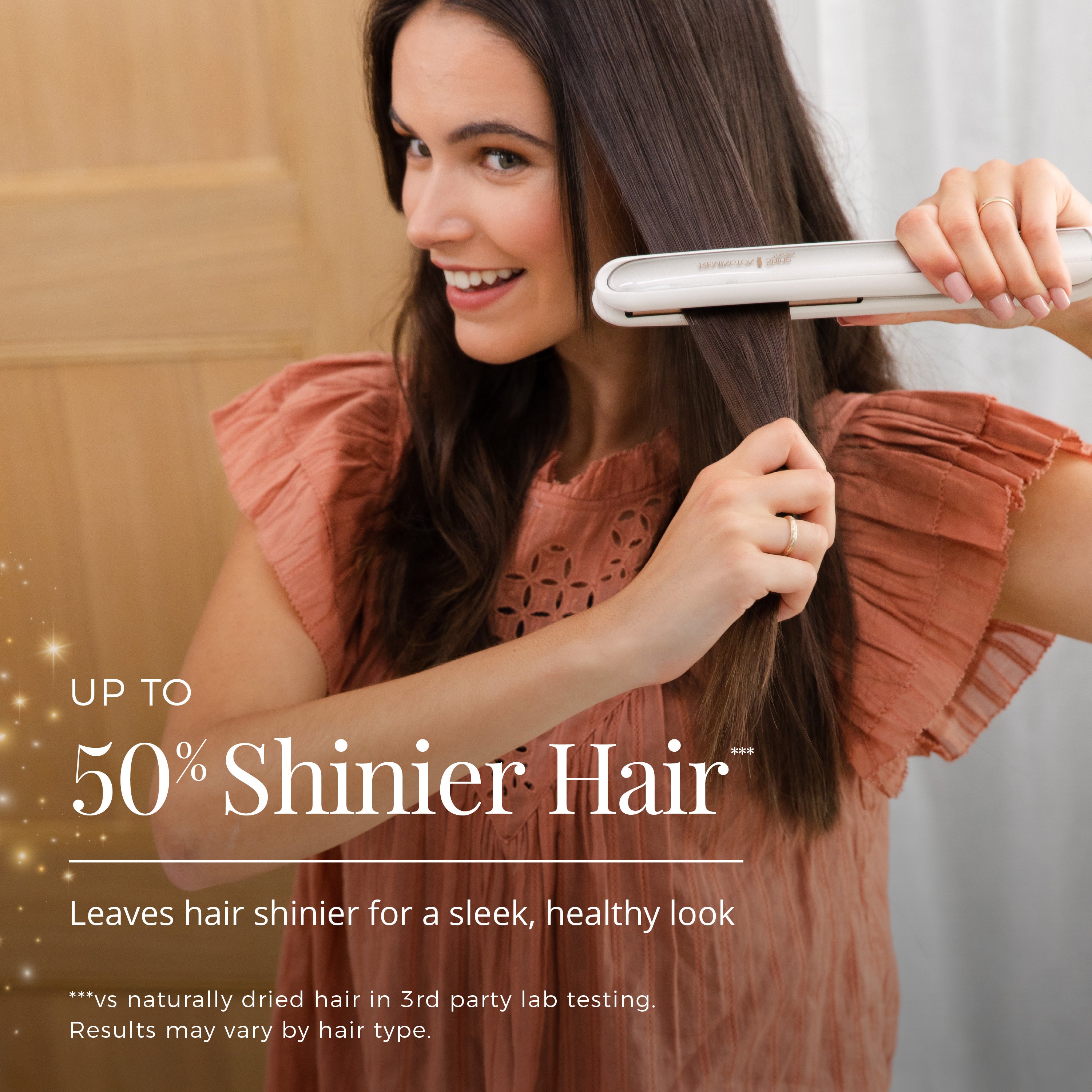 Woman using a hair straightener with text about shinier hair on a blurred background