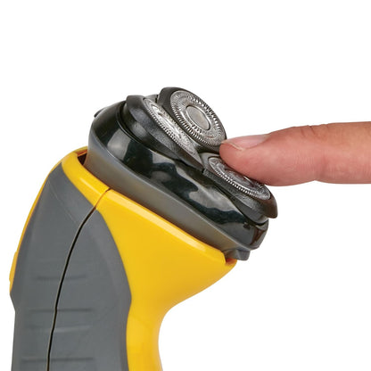 Yellow and gray electric shaver with a hand holding it on a white background